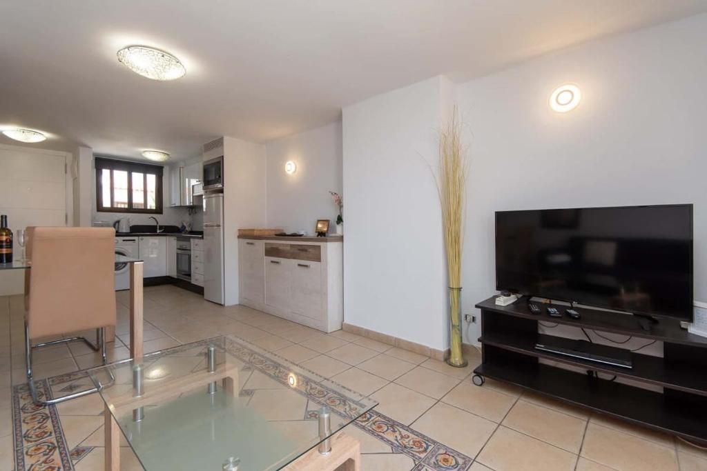 A kitchen or kitchenette at Parque Santiago I 242 - One Bed