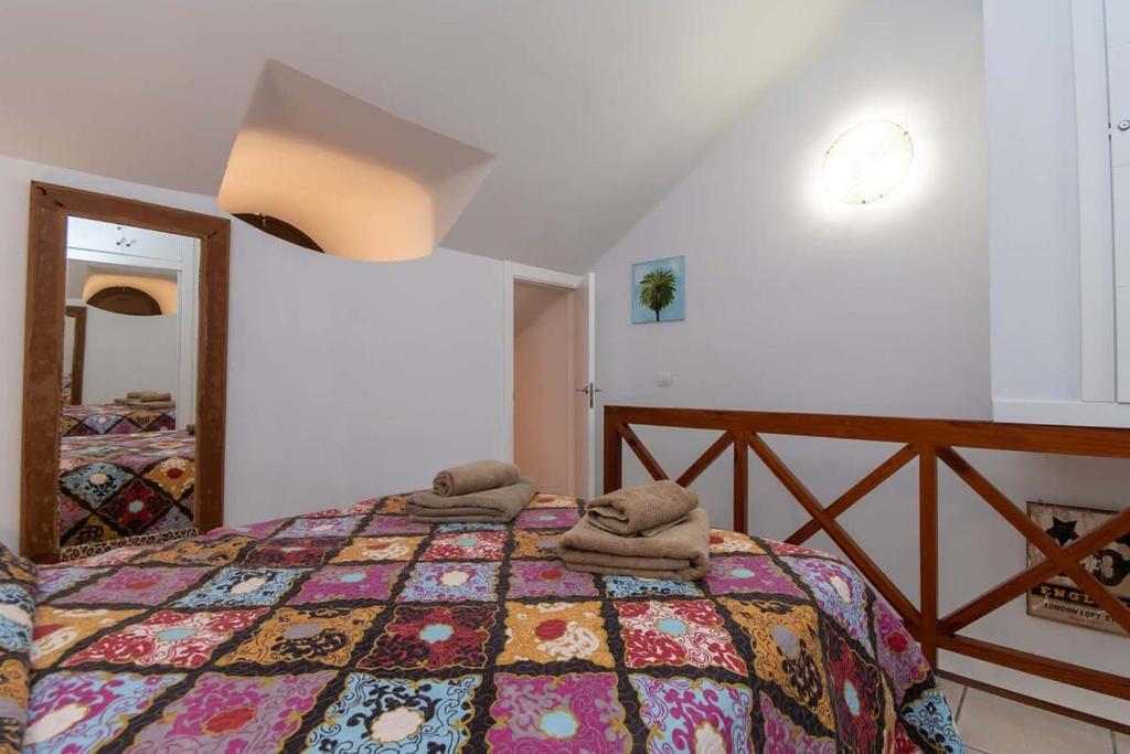 A bed or beds in a room at Parque Santiago I 242 - One Bed