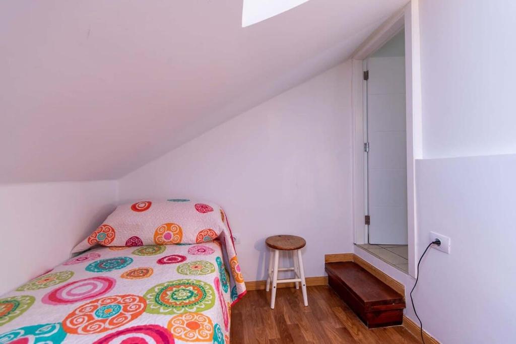 A bed or beds in a room at Parque Santiago I 242 - One Bed