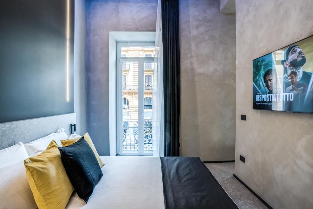 TV a/nebo společenská místnost v ubytování Gallery Experience Napoli