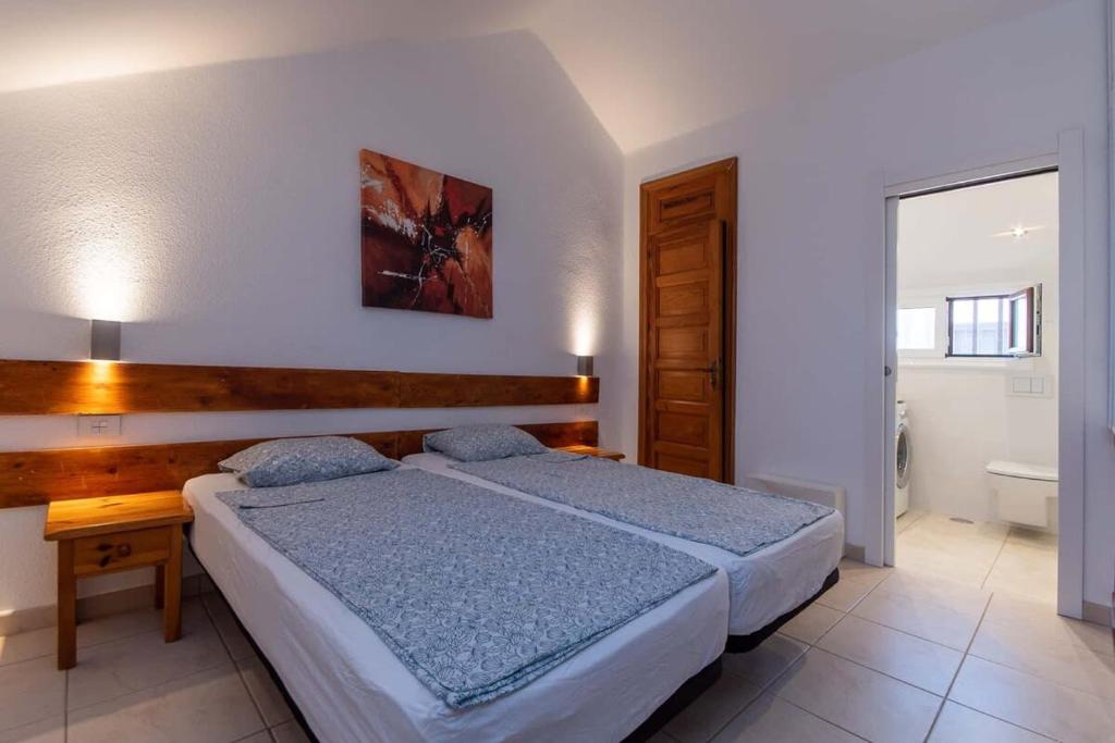 Postel nebo postele na pokoji v ubytování Parque Santiago II 252 - Two Bed