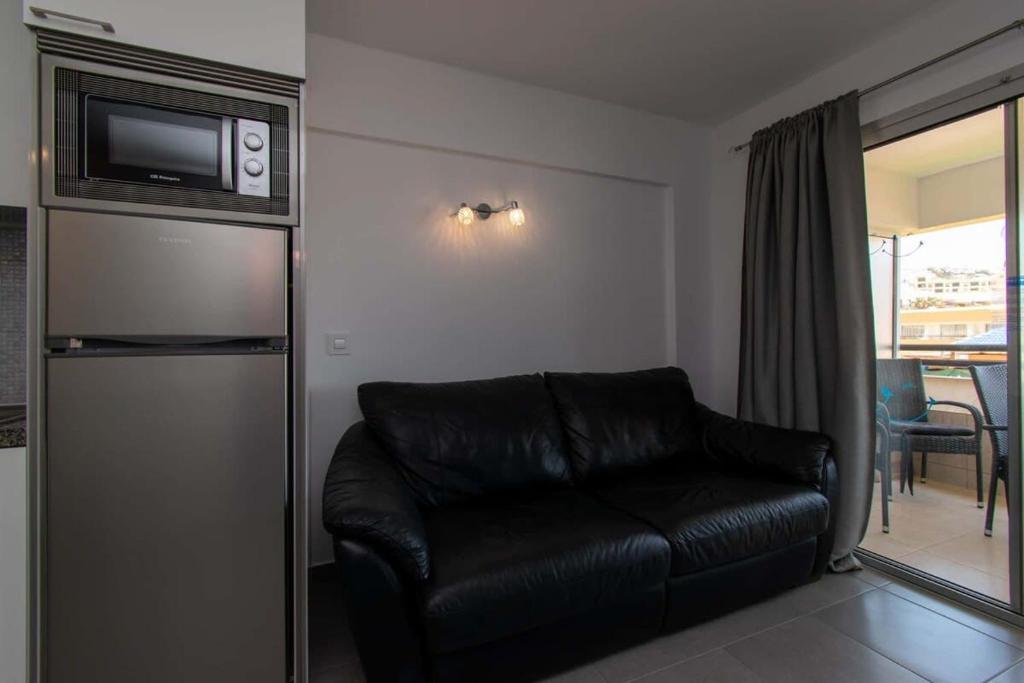 Posezení v ubytování Santa Maria 135 - Studio with air conditioning and pool view