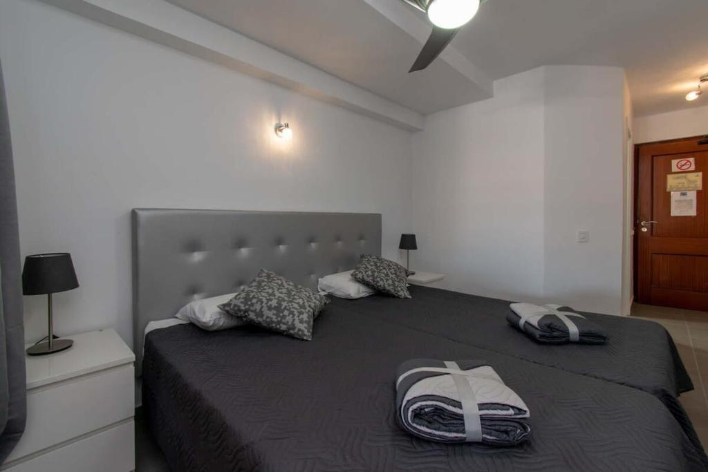 Postel nebo postele na pokoji v ubytování Santa Maria 135 - Studio with air conditioning and pool view