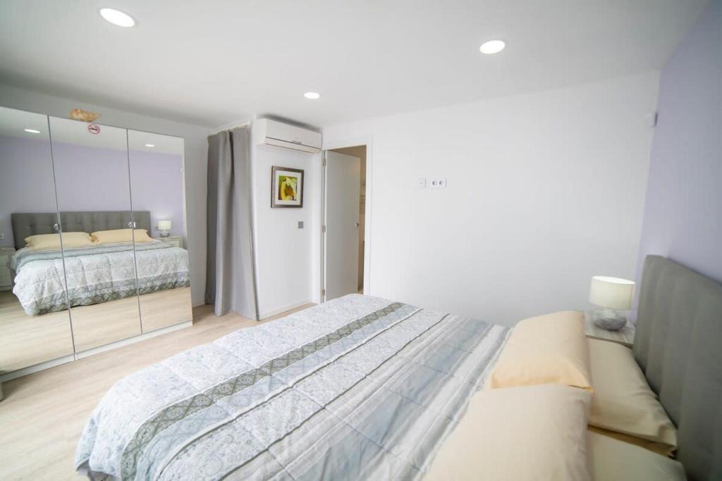 A bed or beds in a room at Villa Whitney