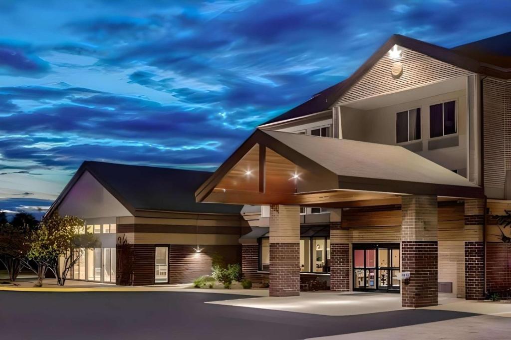 a rendering of a house at night at Comfort Inn & Suites in New Lisbon