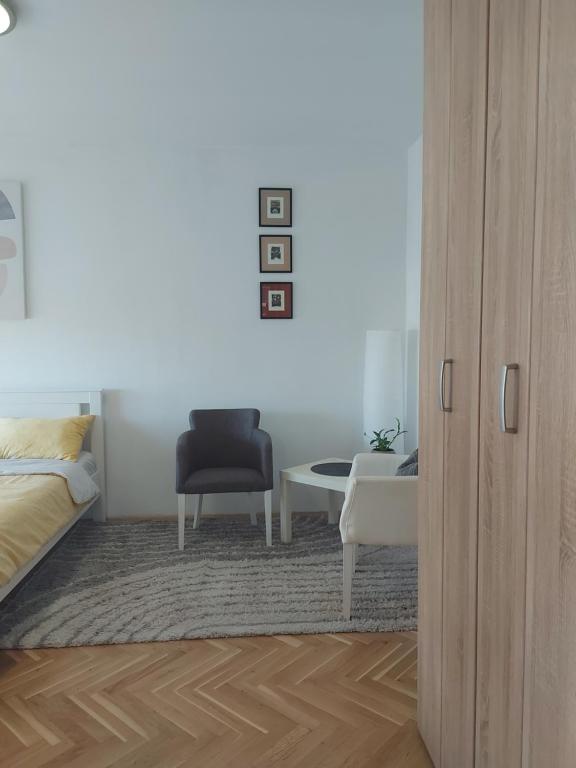 Postel nebo postele na pokoji v ubytování Nikola NS2