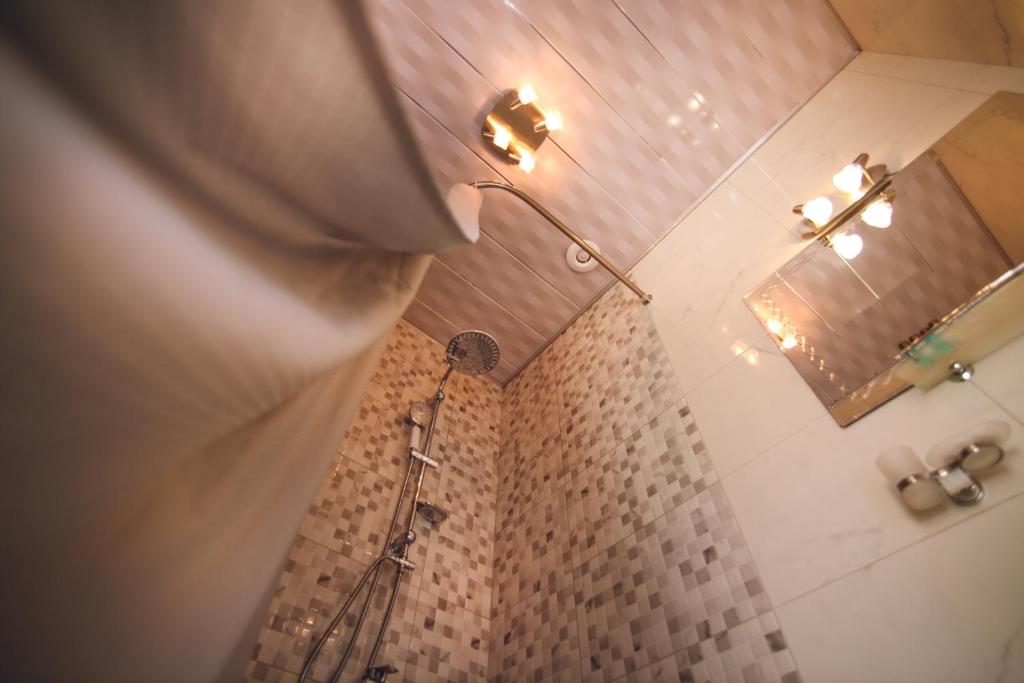 Koupelna v ubytování Kenari Hotel
