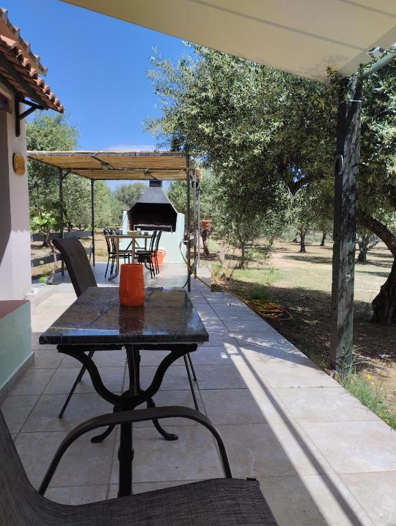 Patio nebo venkovní prostory v ubytování Olea Cottage