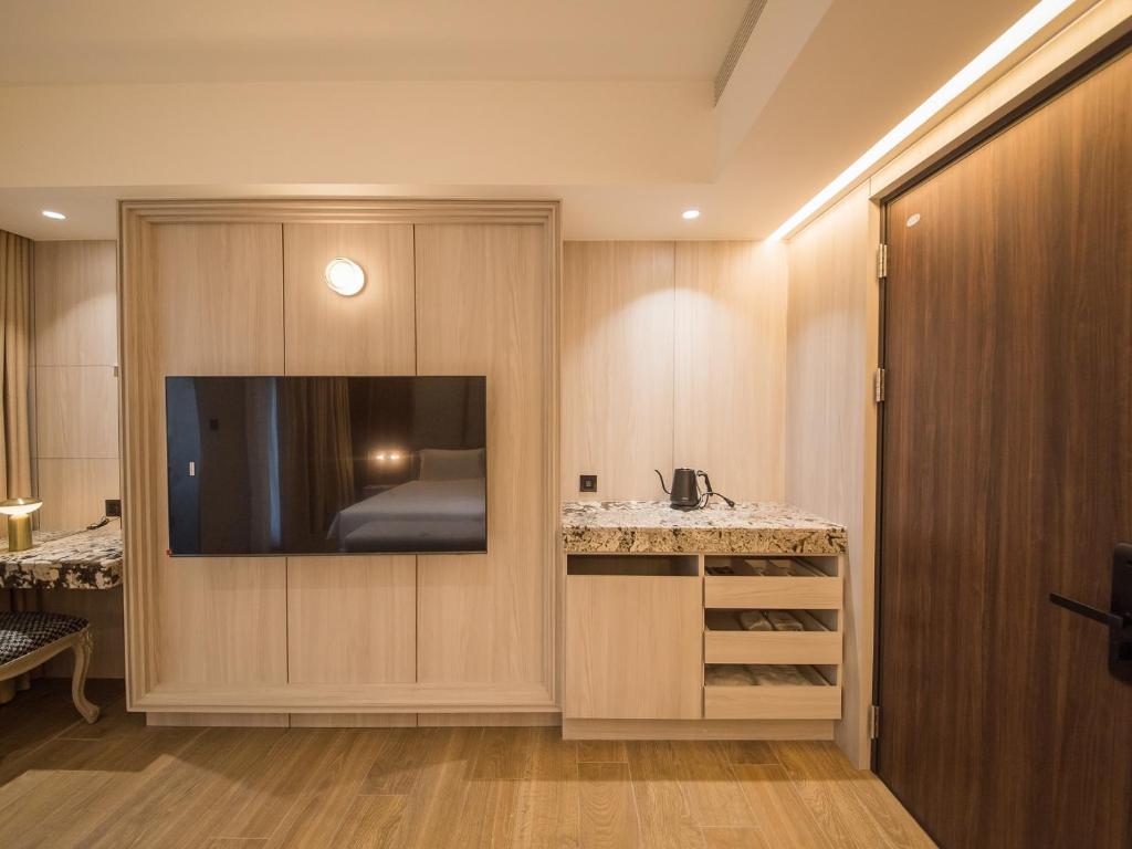 Postel nebo postele na pokoji v ubytování Hôtel de Ľeau