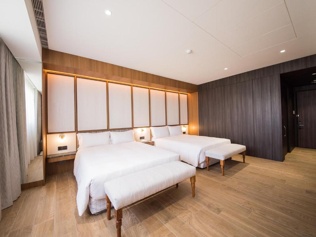 Postel nebo postele na pokoji v ubytování Hôtel de Ľeau