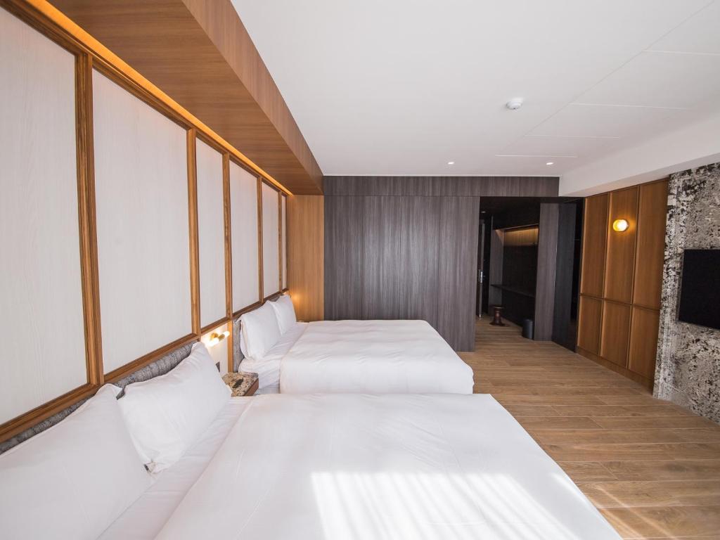 Postel nebo postele na pokoji v ubytování Hôtel de Ľeau