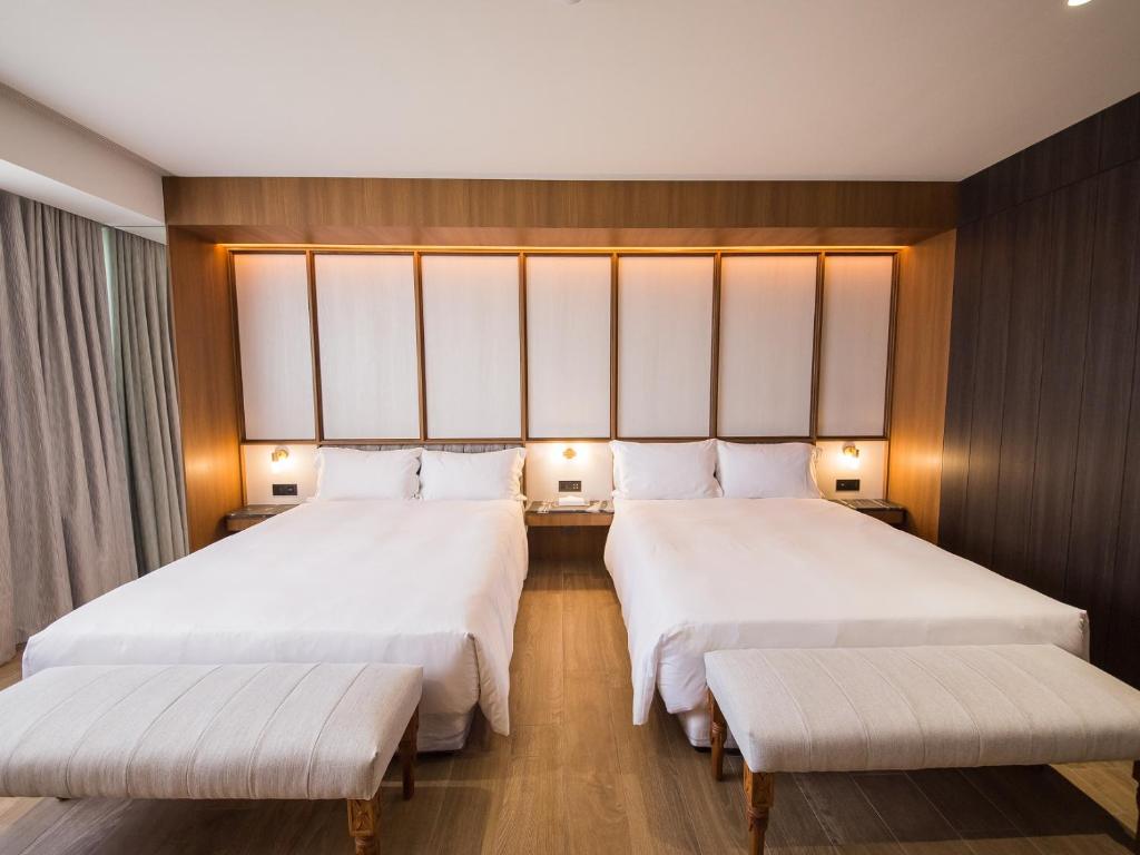 Postel nebo postele na pokoji v ubytování Hôtel de Ľeau