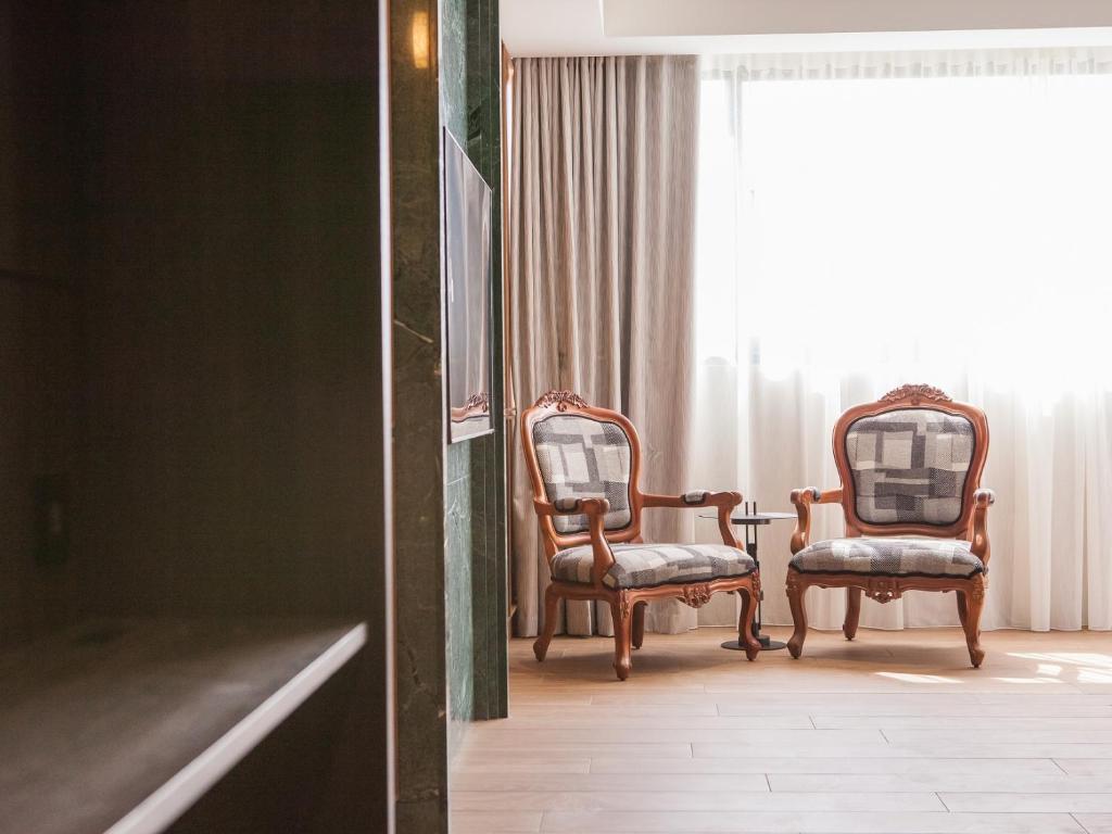 Posezení v ubytování Hôtel de Ľeau