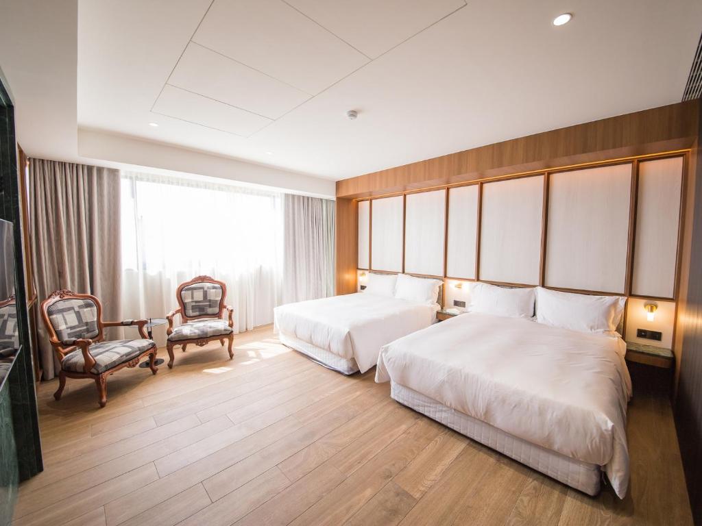 Postel nebo postele na pokoji v ubytování Hôtel de Ľeau
