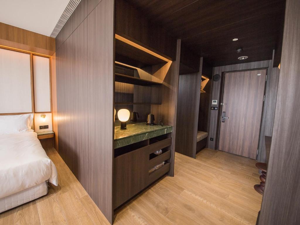 Postel nebo postele na pokoji v ubytování Hôtel de Ľeau