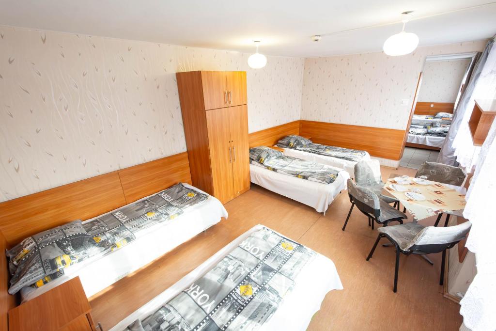 Postel nebo postele na pokoji v ubytování Twój Hostel Ruda Śląska