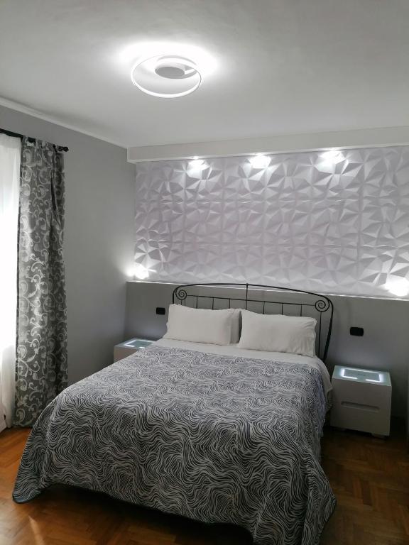 A bed or beds in a room at Il Melangolo