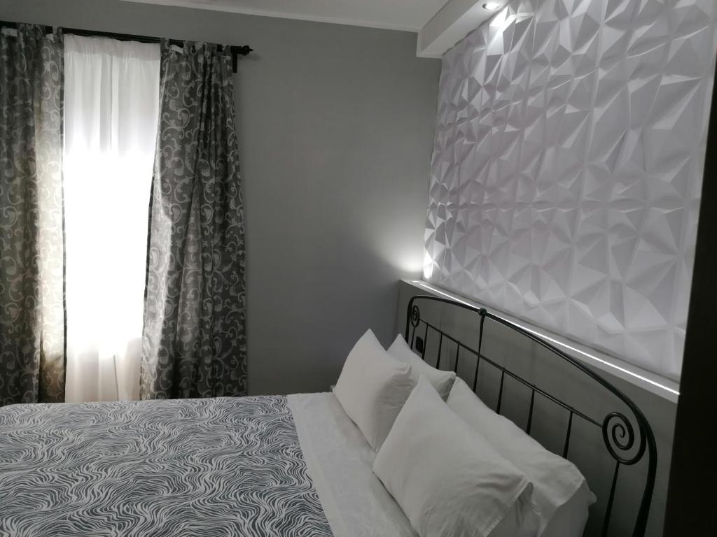 A bed or beds in a room at Il Melangolo