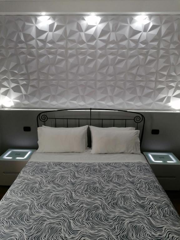 A bed or beds in a room at Il Melangolo