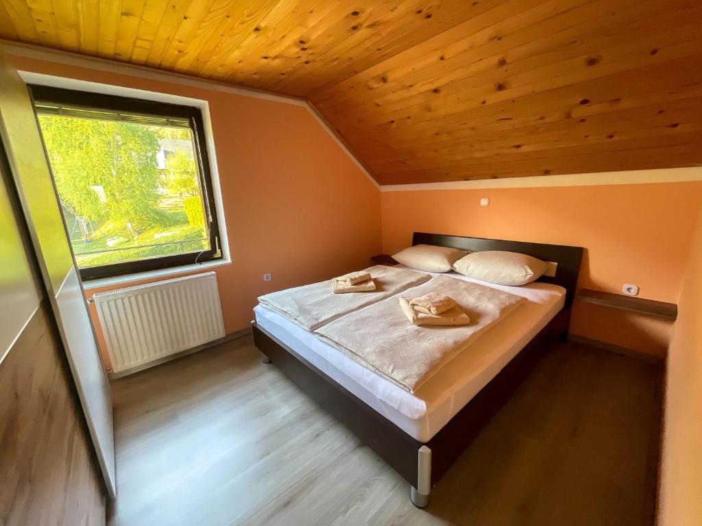 Postel nebo postele na pokoji v ubytování Apartment Zupan