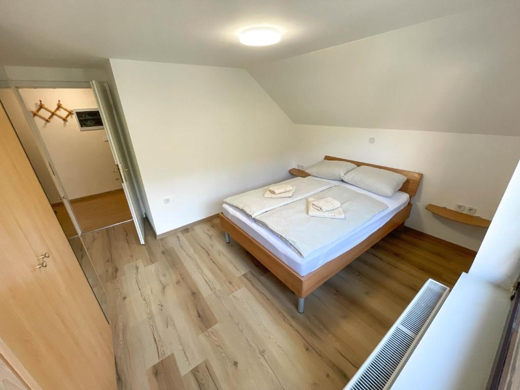 Postel nebo postele na pokoji v ubytování Apartment Zupan