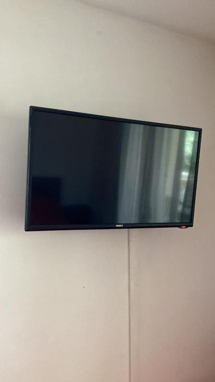 TV a/nebo společenská místnost v ubytování Apartments Arina