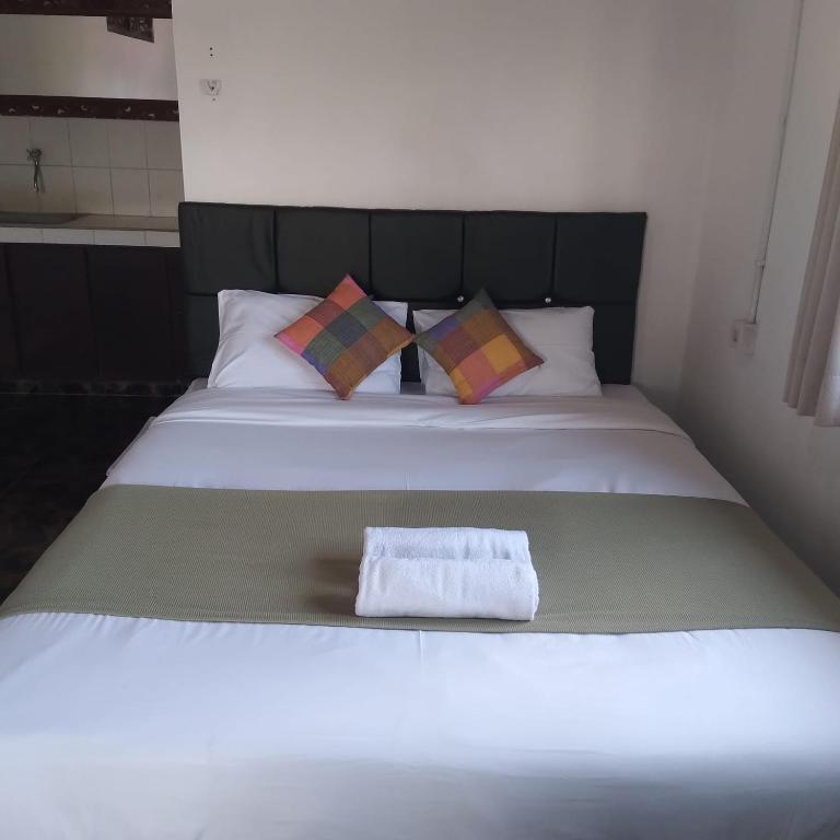 Postel nebo postele na pokoji v ubytování Inn Between