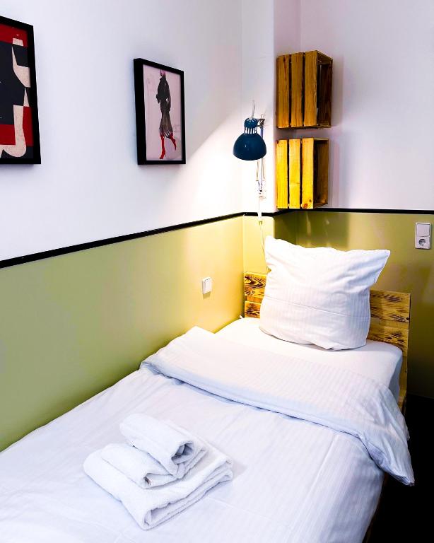 Postel nebo postele na pokoji v ubytování Hotel Alex Berlin