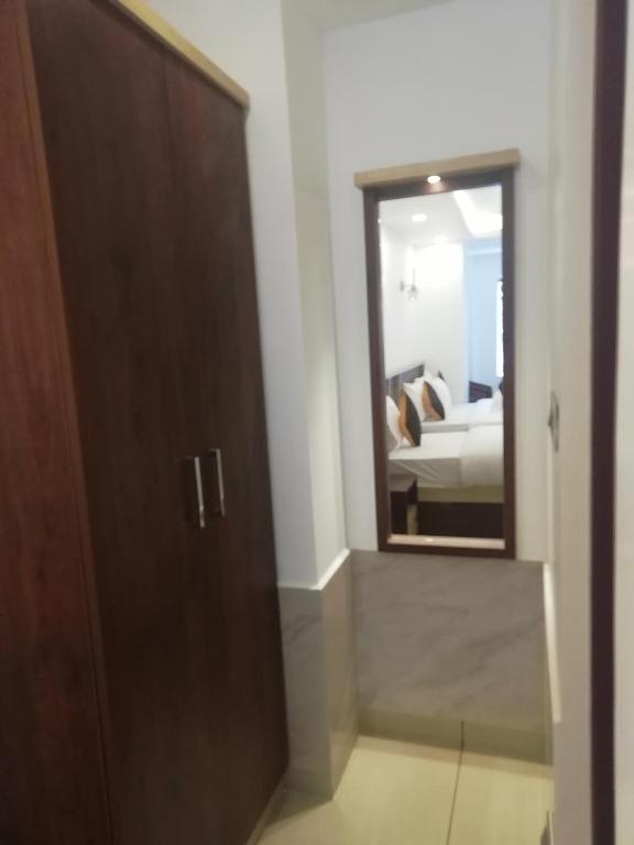 Postel nebo postele na pokoji v ubytování PAUL RESIDENCY