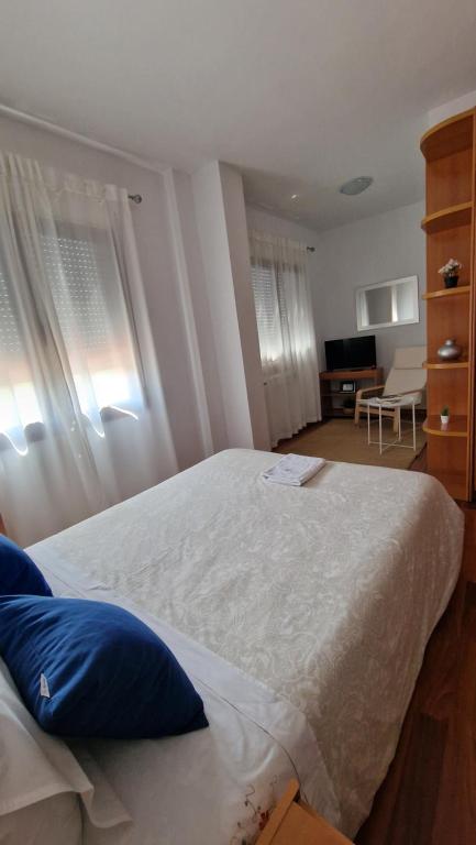 Postel nebo postele na pokoji v ubytování Casa Maria