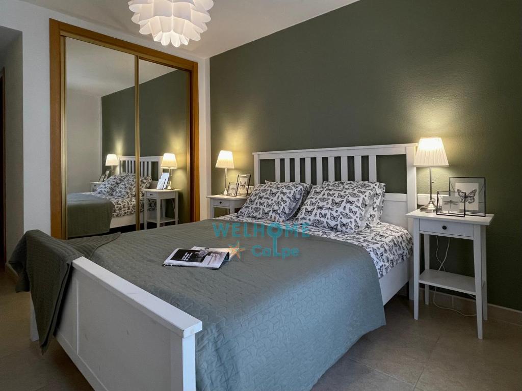Postel nebo postele na pokoji v ubytování MANZANA bonito y cómodo apartamento con piscina