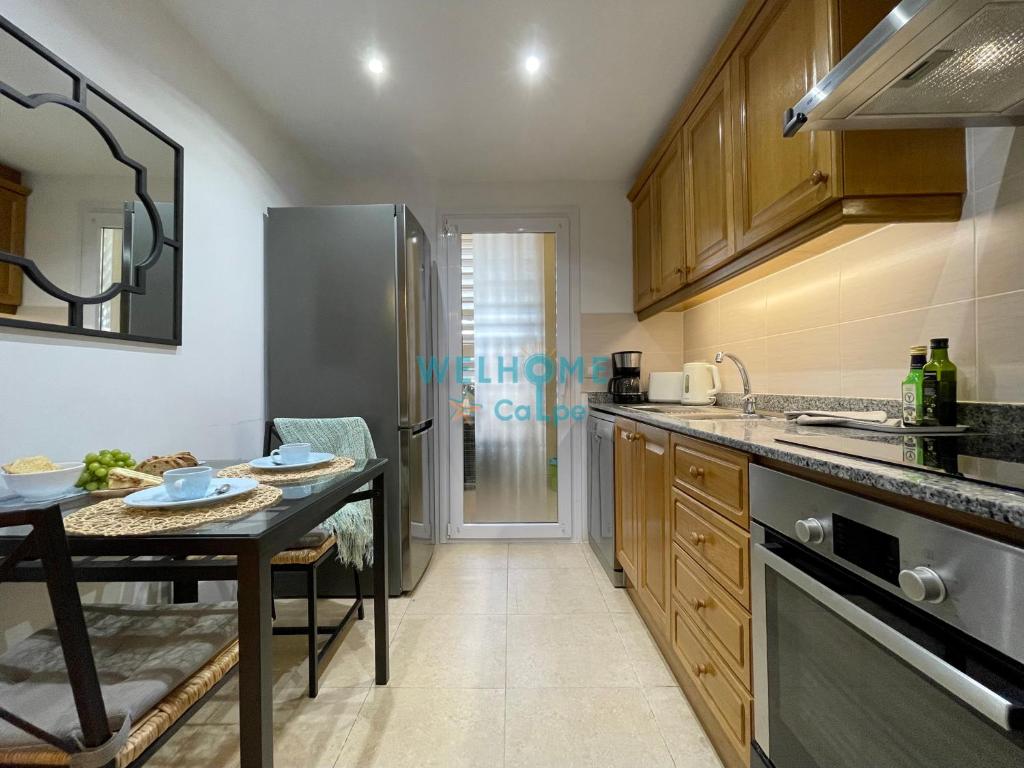 Kuchyň nebo kuchyňský kout v ubytování MANZANA bonito y cómodo apartamento con piscina