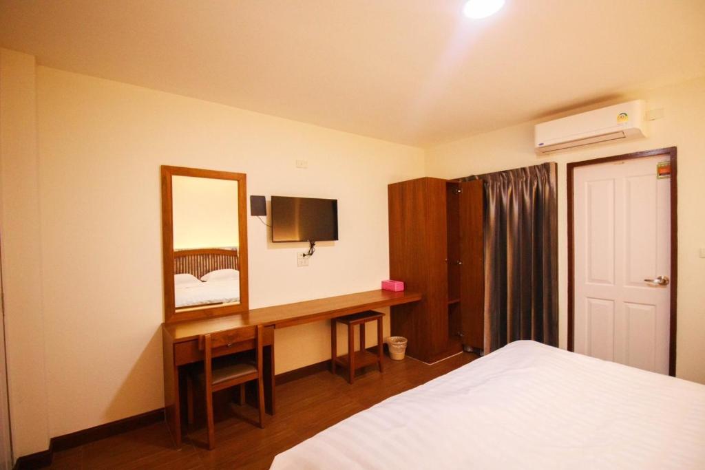 Postel nebo postele na pokoji v ubytování BK Hotel
