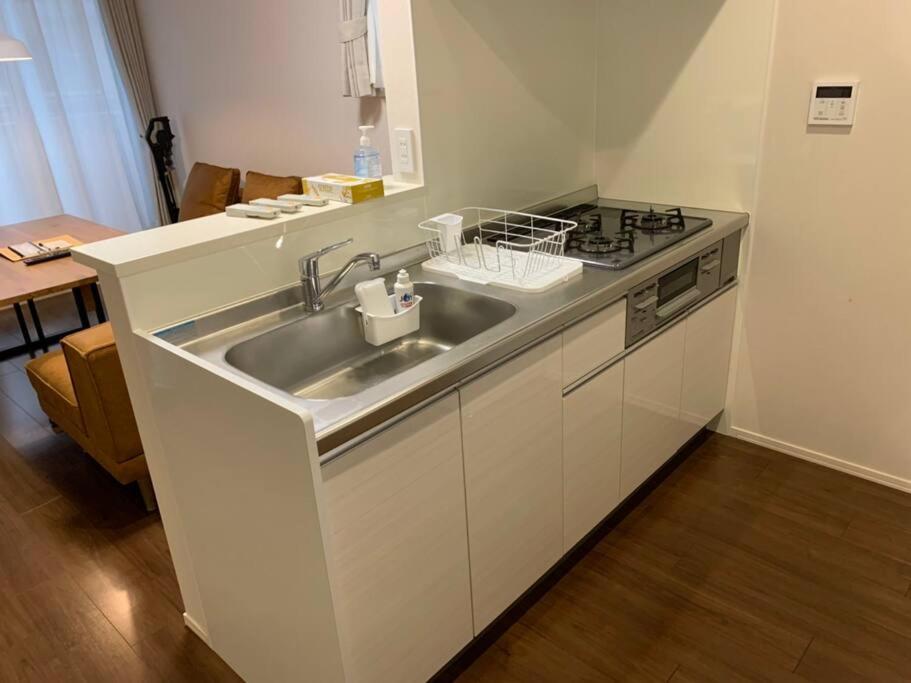 Kuchyň nebo kuchyňský kout v ubytování Maizon de Aile Room D