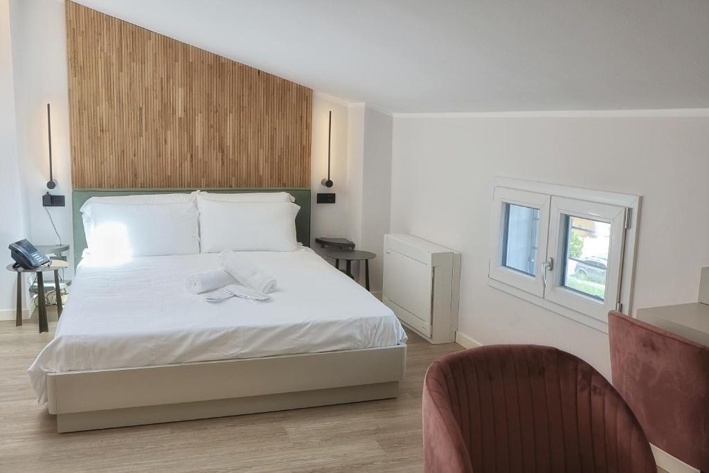 Postel nebo postele na pokoji v ubytování Hotel Miratorre superior