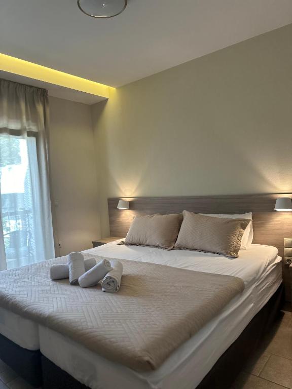 Postel nebo postele na pokoji v ubytování Yulia Luxury Apartments