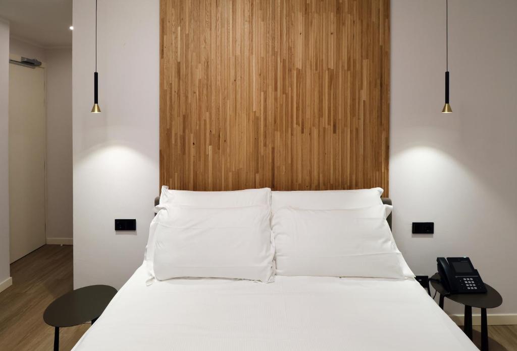 Postel nebo postele na pokoji v ubytování Hotel Miratorre superior