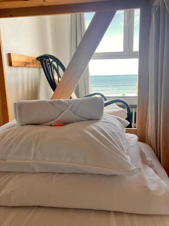 Postel nebo postele na pokoji v ubytování Boogalow Hostel