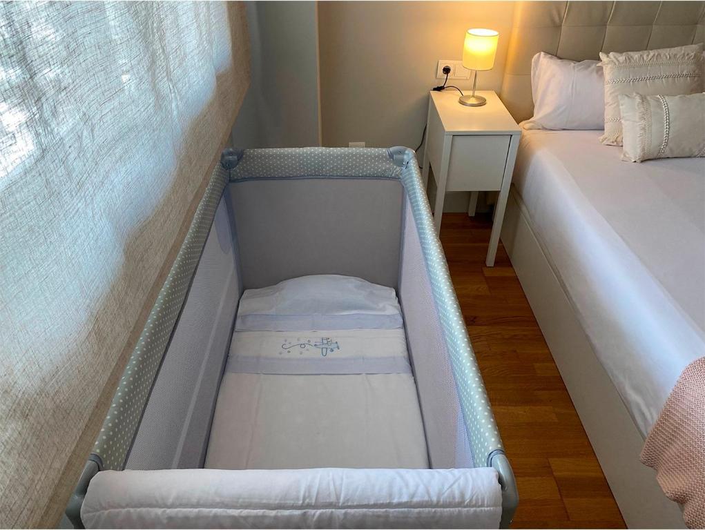 Posteľ alebo postele v izbe v ubytovaní Playa Pacífico Apartment