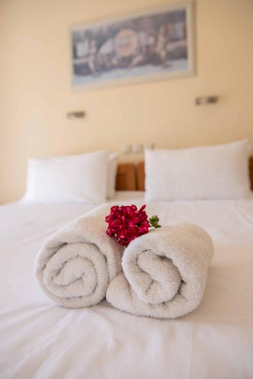 Postel nebo postele na pokoji v ubytování Lea Family Resort