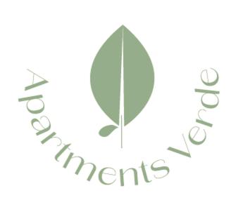 un logotipo de hoja verde con las palabras "inmigrantes de prosperidad" en Apartments Verde, en Grein
