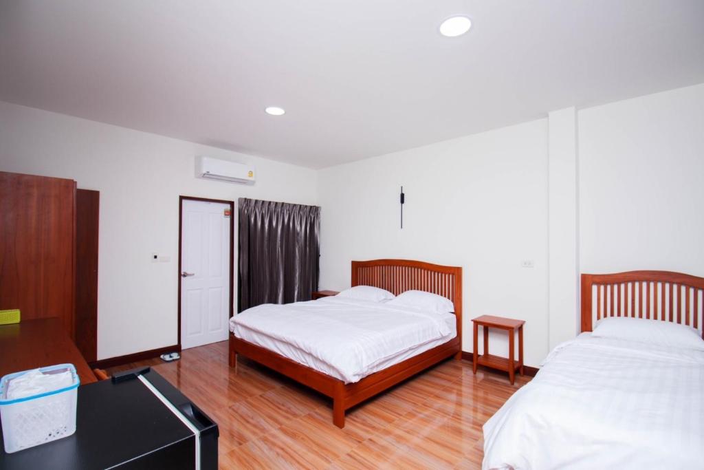 Postel nebo postele na pokoji v ubytování BK Hotel