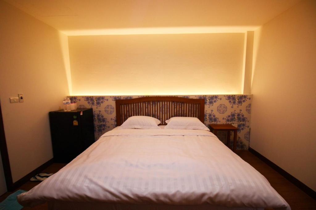 Postel nebo postele na pokoji v ubytování BK Hotel