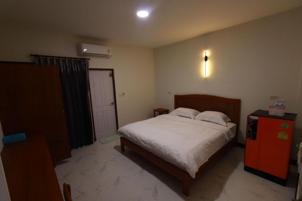 Postel nebo postele na pokoji v ubytování BK Hotel