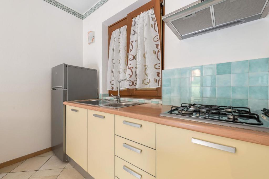 Kuchyň nebo kuchyňský kout v ubytování Residence Tatiana A2