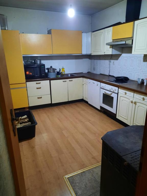Kuchyň nebo kuchyňský kout v ubytování fremdenzimmer