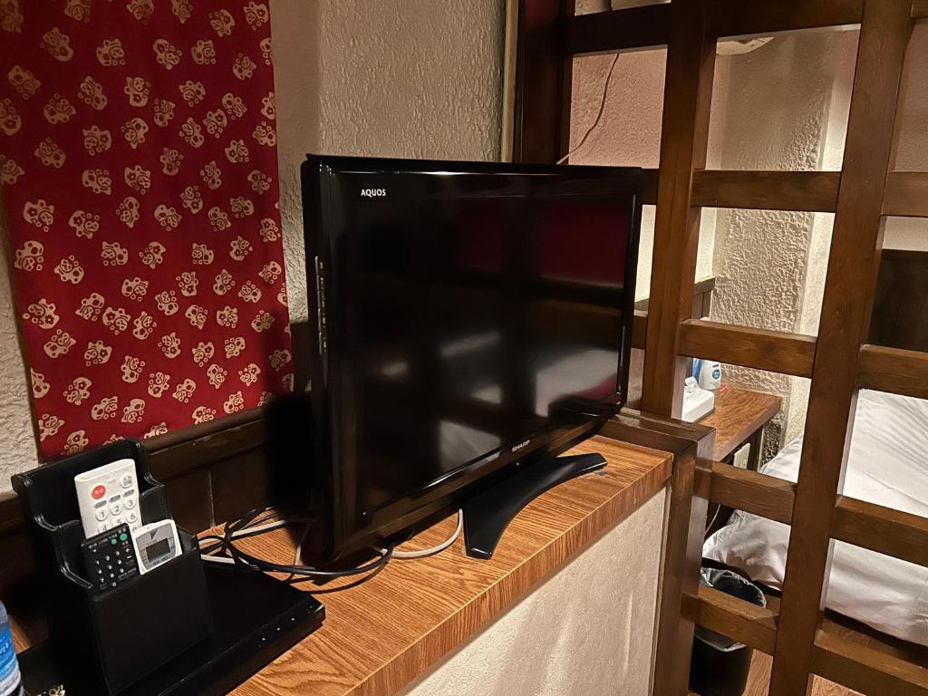 TV a/nebo společenská místnost v ubytování ホテルアイエス