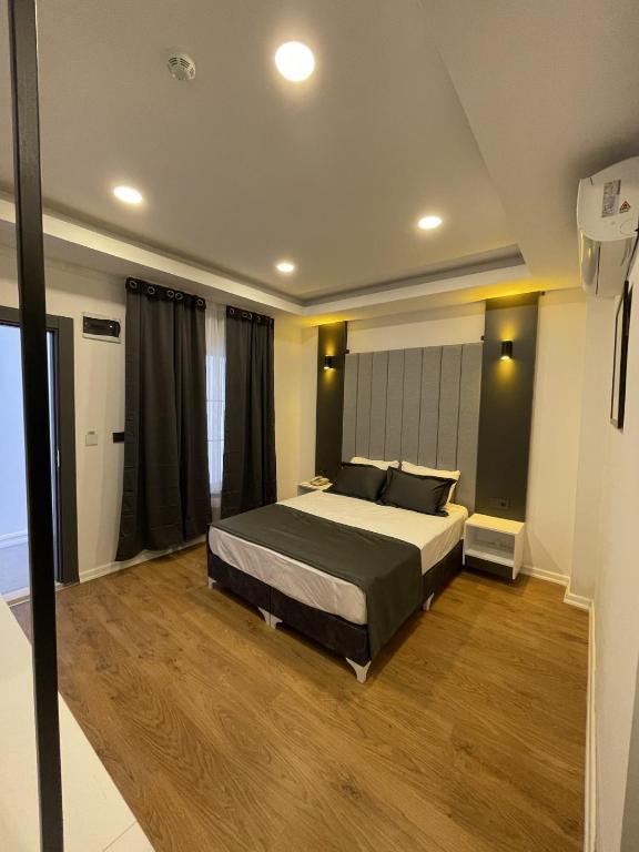 Postel nebo postele na pokoji v ubytování Mi Hotel Boutique