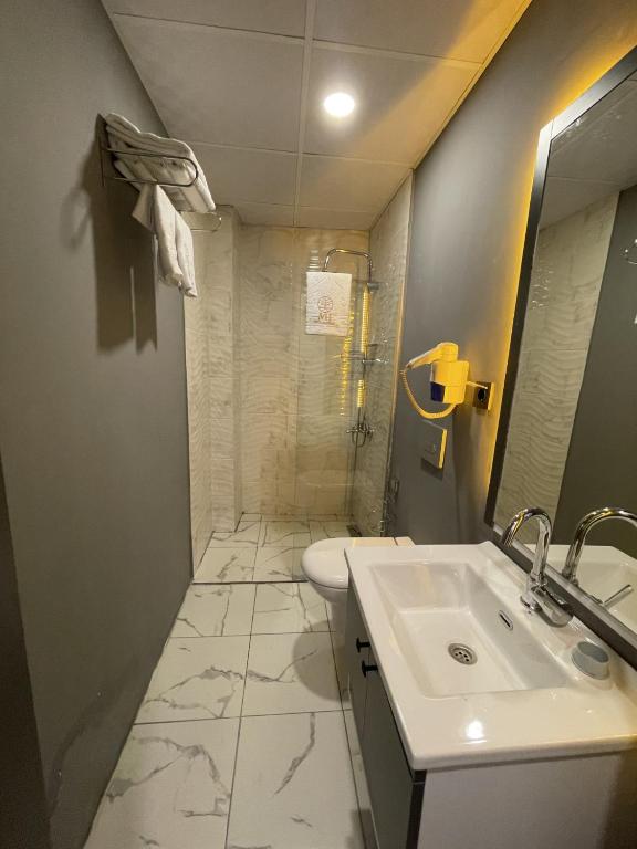 Koupelna v ubytování Mi Hotel Boutique