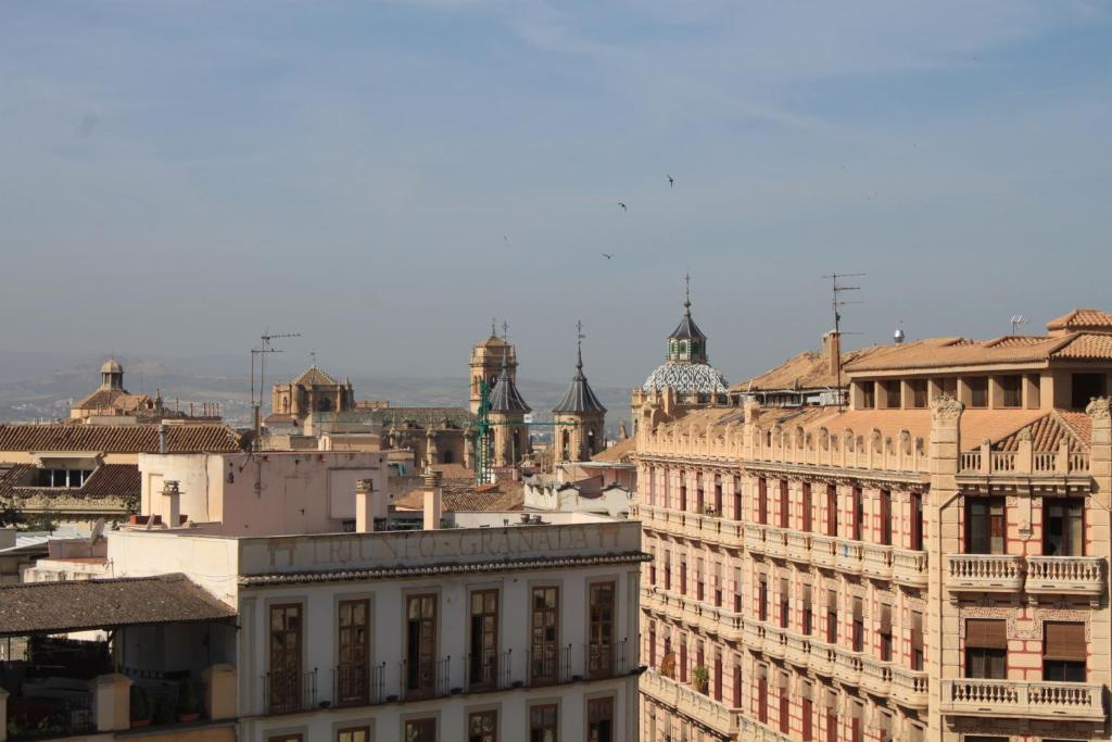 Nespecifikovaný výhled na destinaci Granada nebo výhled na město při pohledu z apartmánu